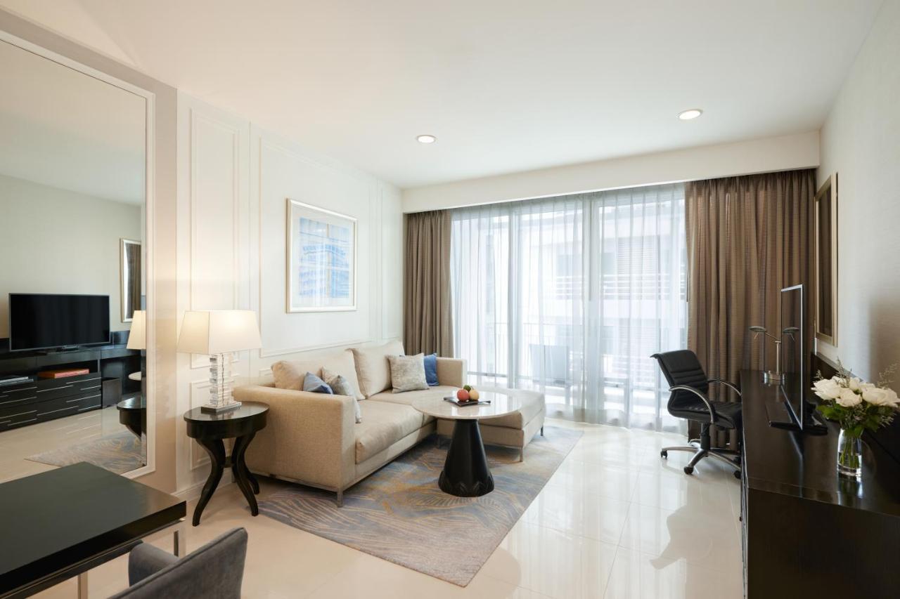 Dusit Suites Hotel Ratchadamri, Μπανγκόκ Εξωτερικό φωτογραφία A living room in a serviced apartment in Singapore