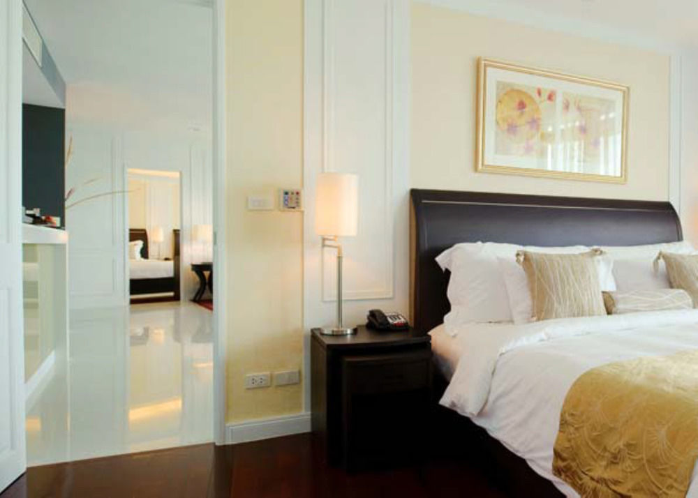 Dusit Suites Hotel Ratchadamri, Μπανγκόκ Εξωτερικό φωτογραφία A bedroom at the hotel